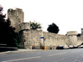 City wall and Arundel Tower with Catchcold Tower to the right. Photo Charles Taylor.